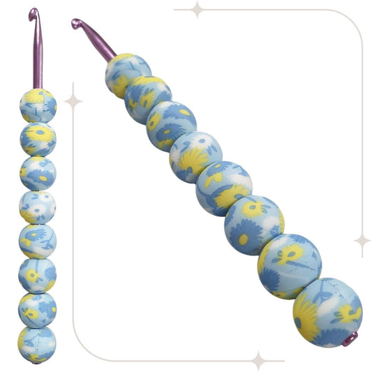ergonomische Wollhäkelnadel mit Silikonperlen - hellblau / blaue-gelbe Blumen