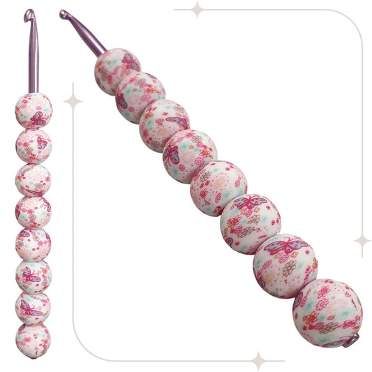 ergonomische Wollhäkelnadel mit Silikonperlen - weiß / pink-türkise Schmetterlinge