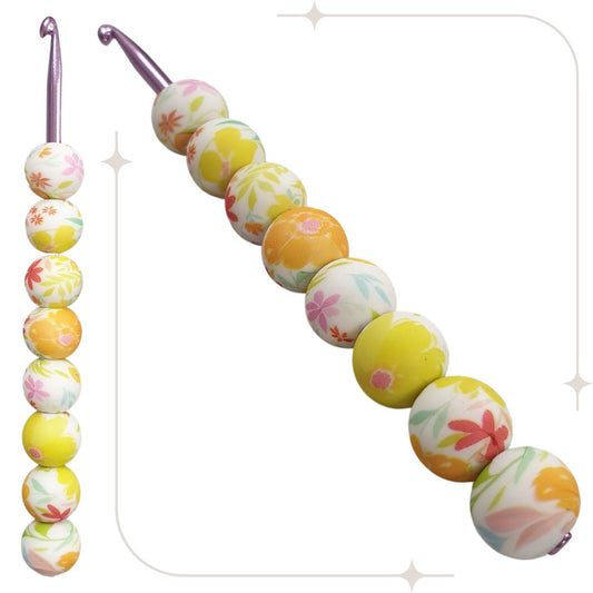 ergonomische Wollhäkelnadel mit Silikonperlen - weiß / gelbe-orange Blumen